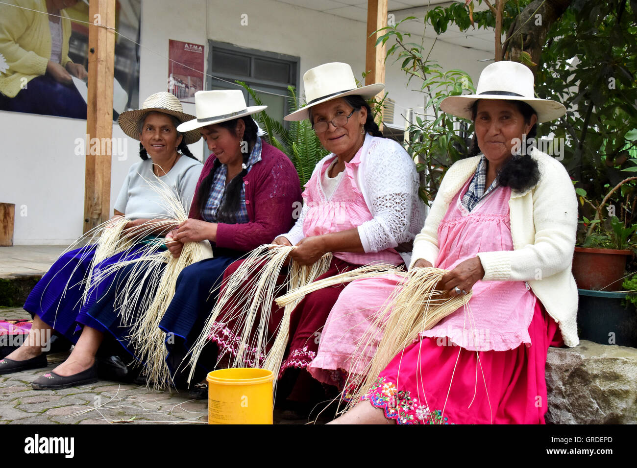 Weaver womans making panama hats Stock Photo