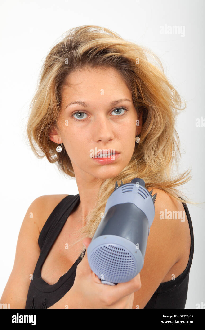Young Blonde Blow Dries Her Hair From The Front Stock Photo - Alamy