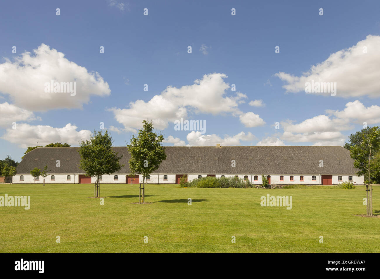White stables in the park at fuglsang hires stock photography and
