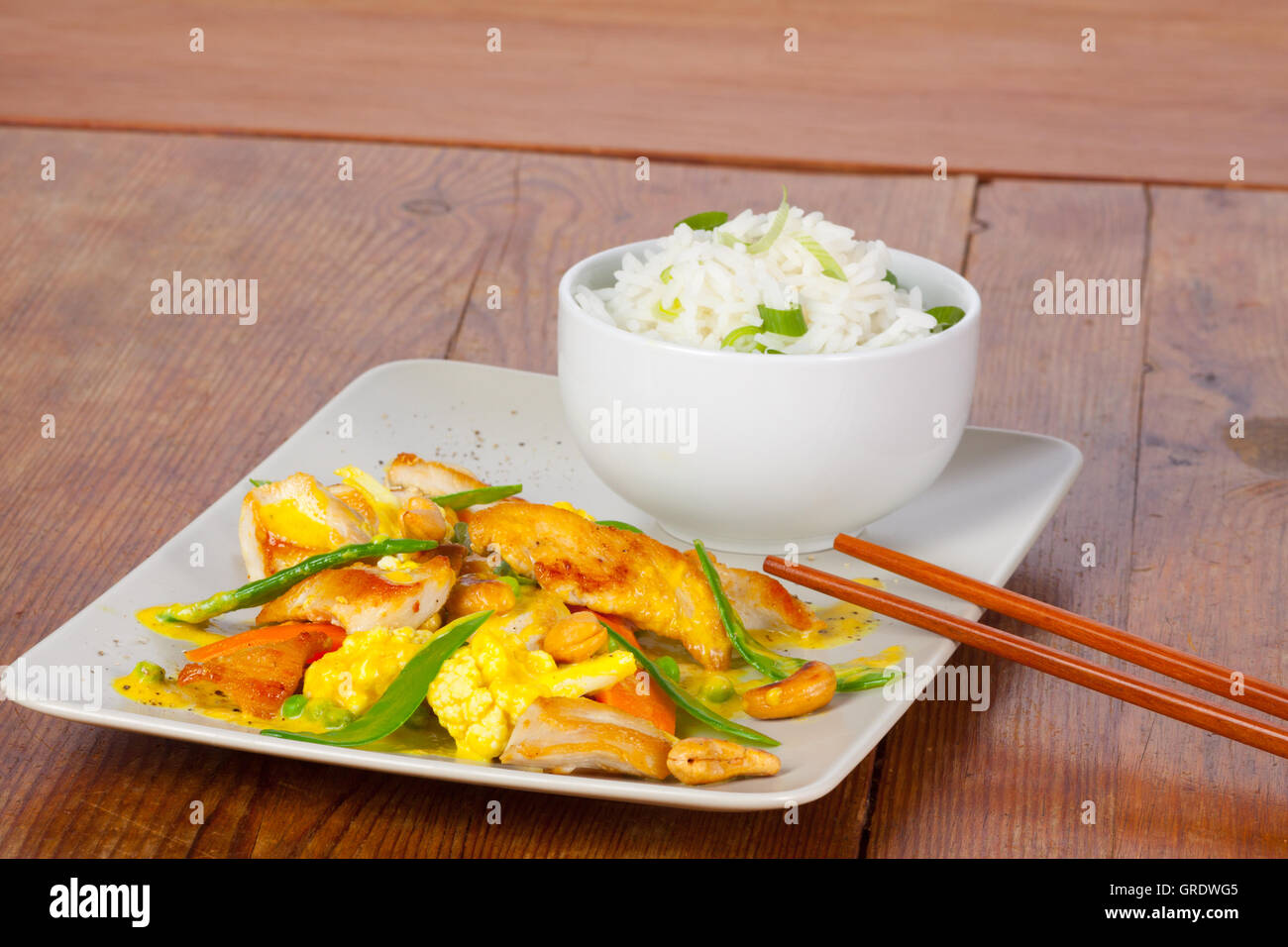 Chicken Filet With Beans And Vegetables Rice In Bowl Stock Photo