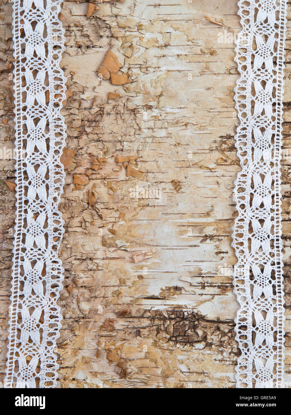 Wooden background with white lace Stock Photo