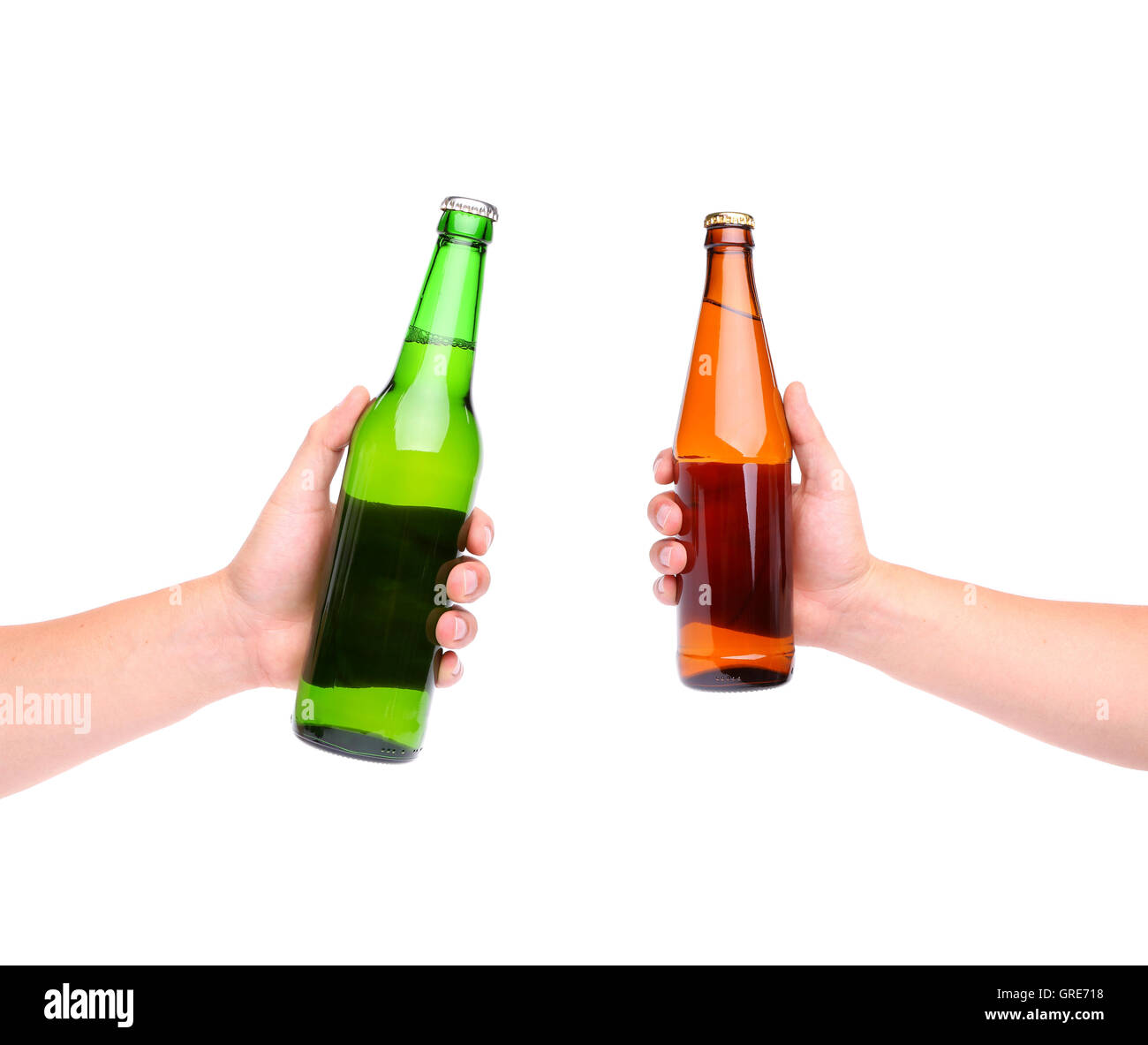 Two beer bottles and hands Stock Photo Alamy