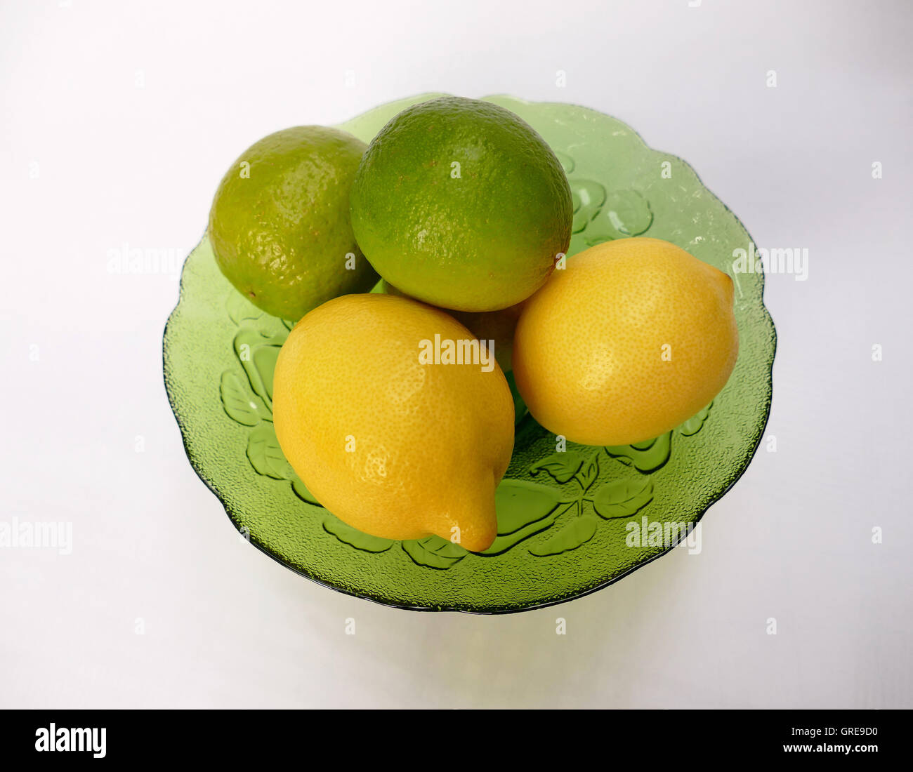 Lemons And Limes In A Glass Dish Stock Photo Alamy