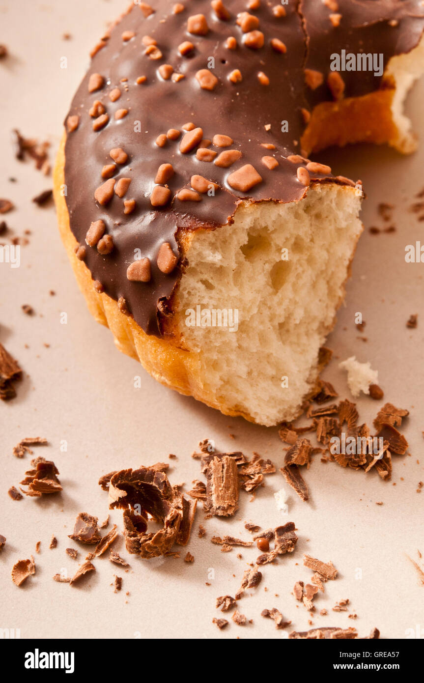 donut with chocolate frosting, partially eaten Stock Photo
