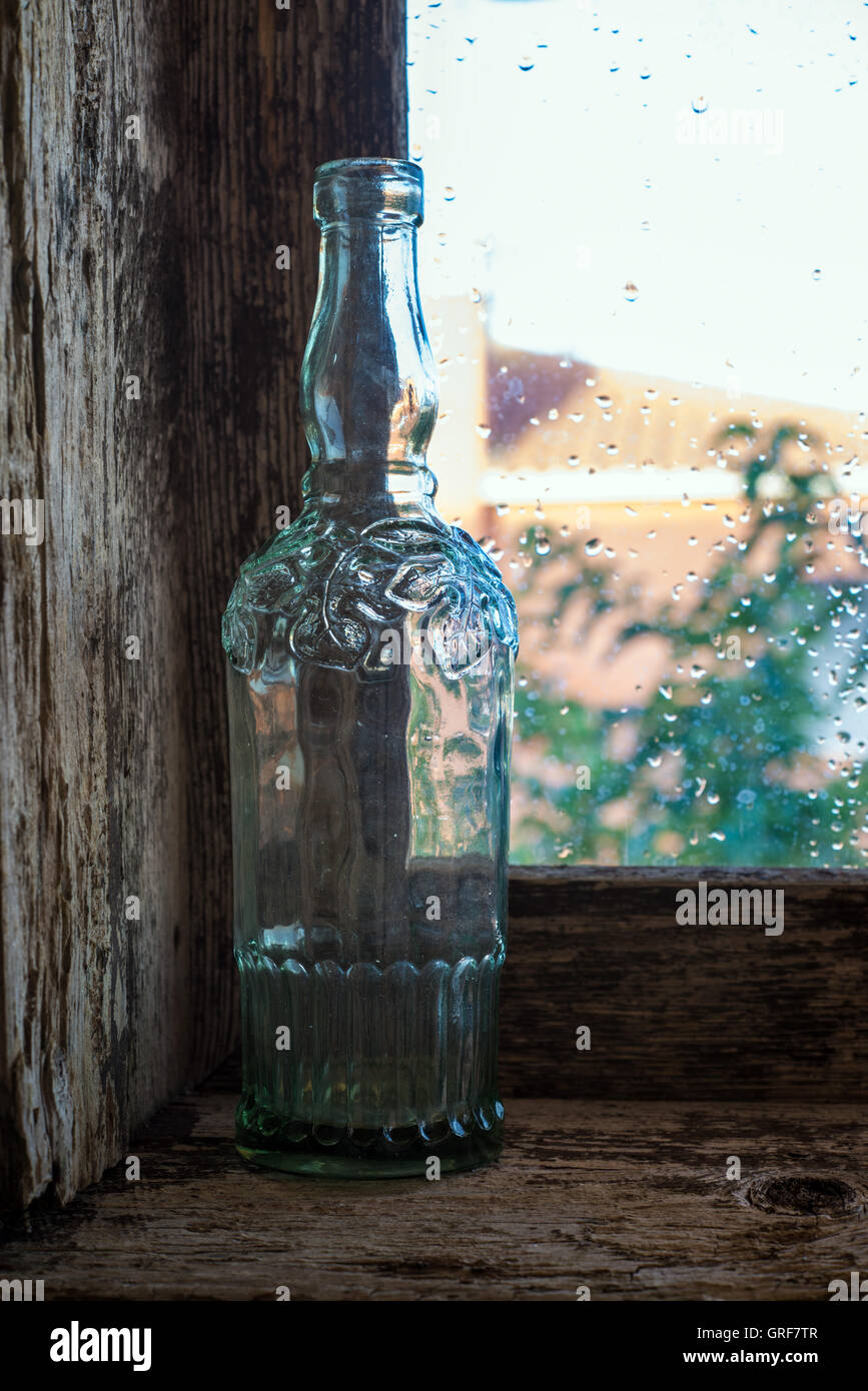glass bottle on a window sill Stock Photo Alamy