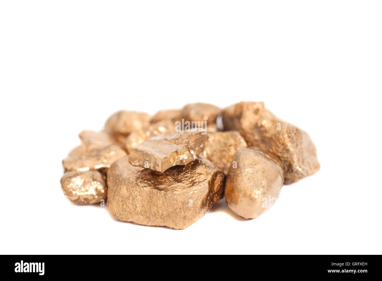 Golden nuggets isolated on white background Stock Photo - Alamy