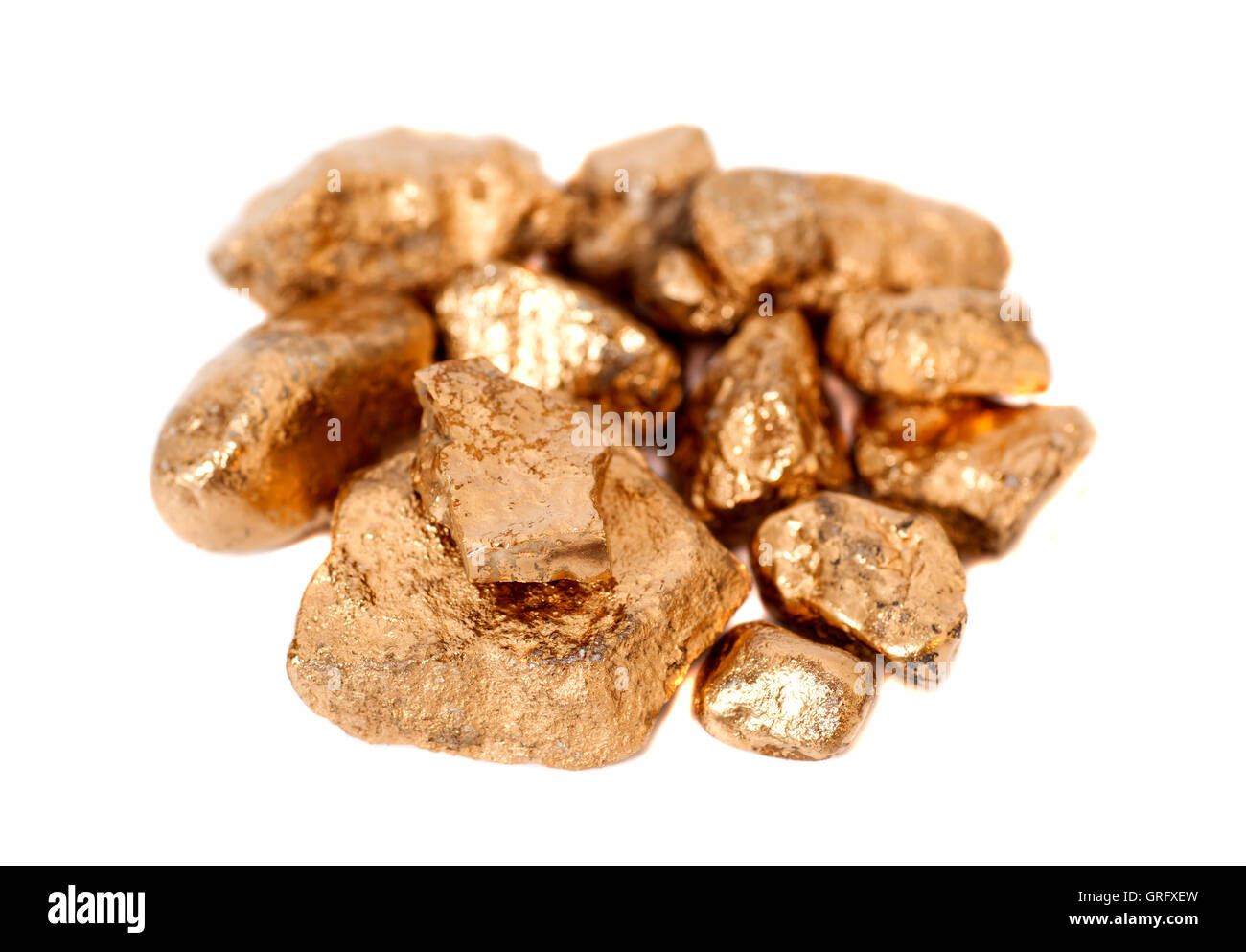 Golden nuggets isolated on white background Stock Photo - Alamy