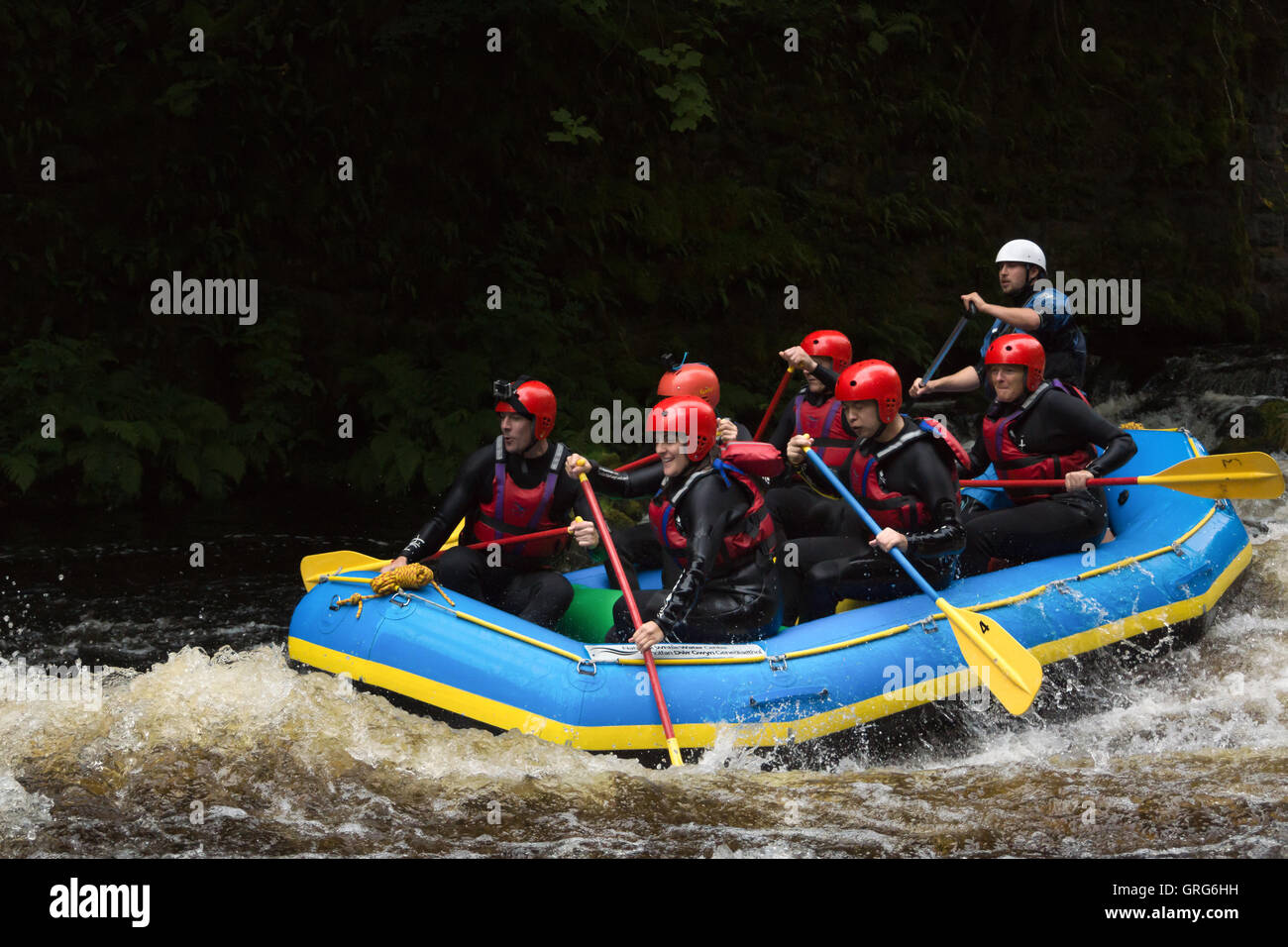 White water rafting at the National White Water Centre on the River Tryweryn outside Bala North Wales Stock Photo