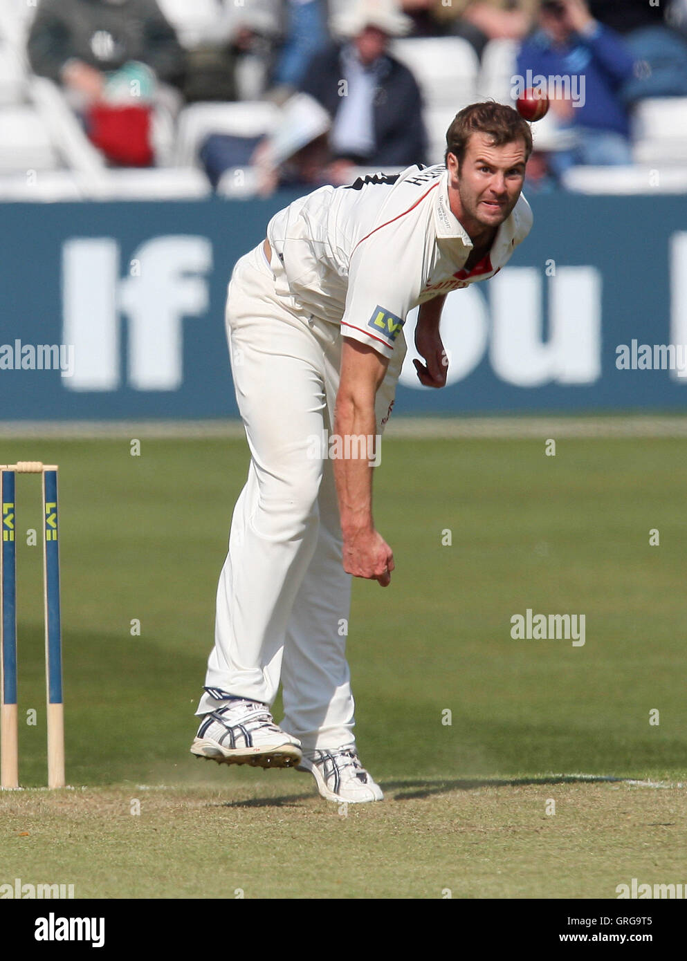 Tom Smith in bowling action for Lancs - Essex CCC vs Lancashire CCC - LV County Championship Division One Cricket at Ford County Ground, Chelmsford -  21/04/10 Stock Photo