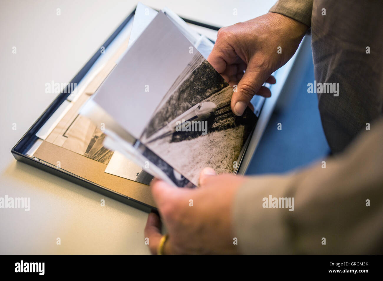 Berlin, Germany. 6th Sep, 2016. Susanne Kill, director of the department company history at Deutsche Bahn, looking through photos made by train historian Alfred Gottwaldt in Berlin, Germany, 6 September 2016. The archive of the train historian consists of 200 boxes. One year after the death of the man from Berlin, the Deutsche Bahn foundation bought the inheritance from hiss descendants. PHOTO: SOPHIA KEMBOWSKI/dpa/Alamy Live News Stock Photo