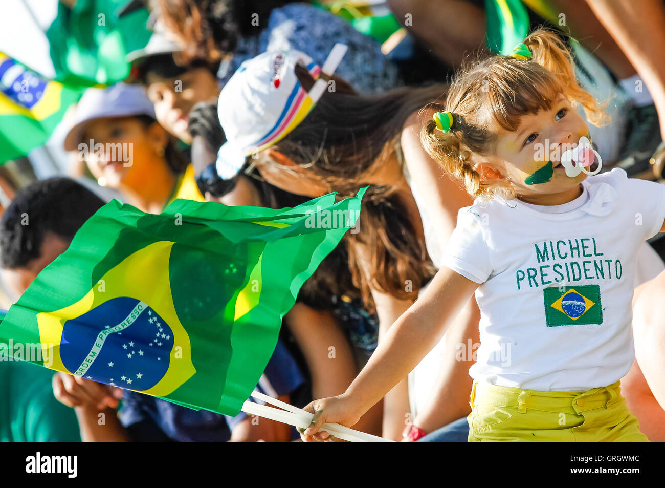 Girl holding brazilian flag hi-res stock photography and images - Alamy
