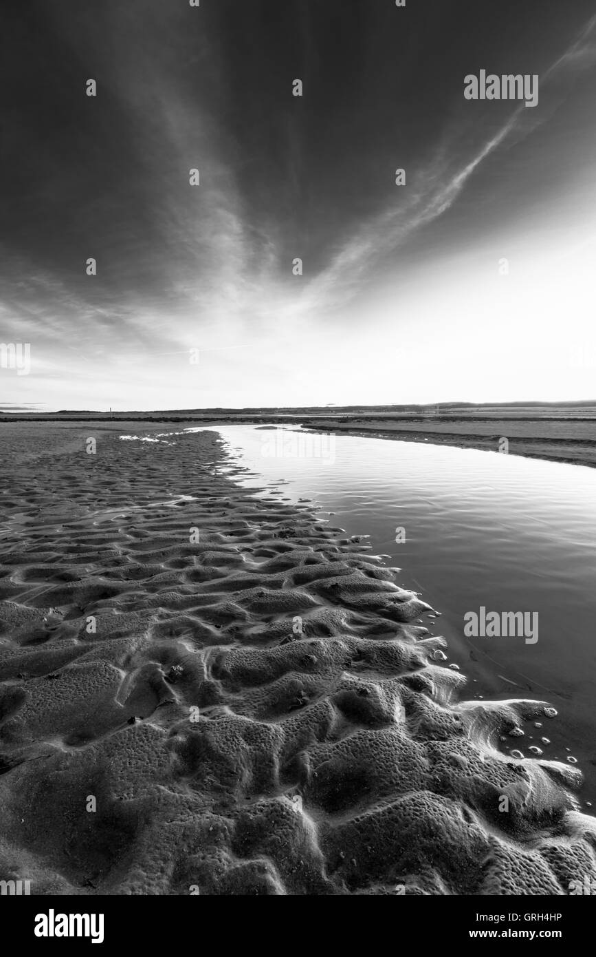 Holy Island causeway at low tide - Northumberland, UK Stock Photo