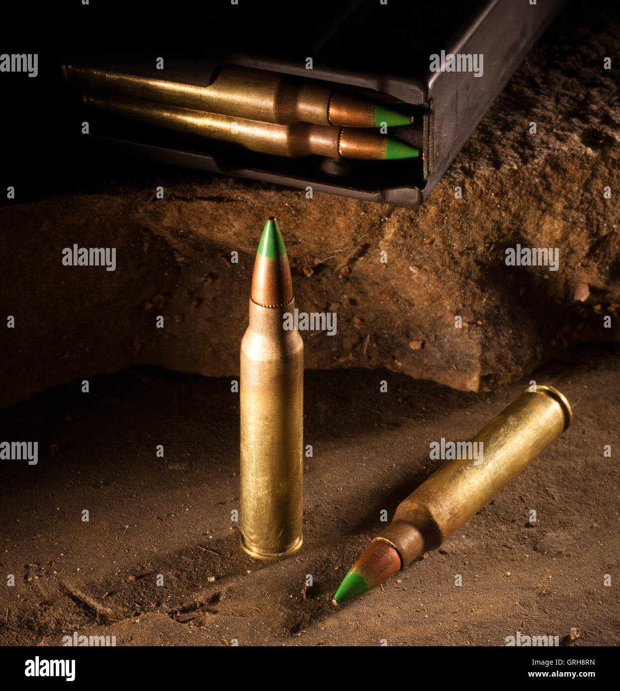 Cartridges with a green tip and a loaded magazine Stock Photo Alamy
