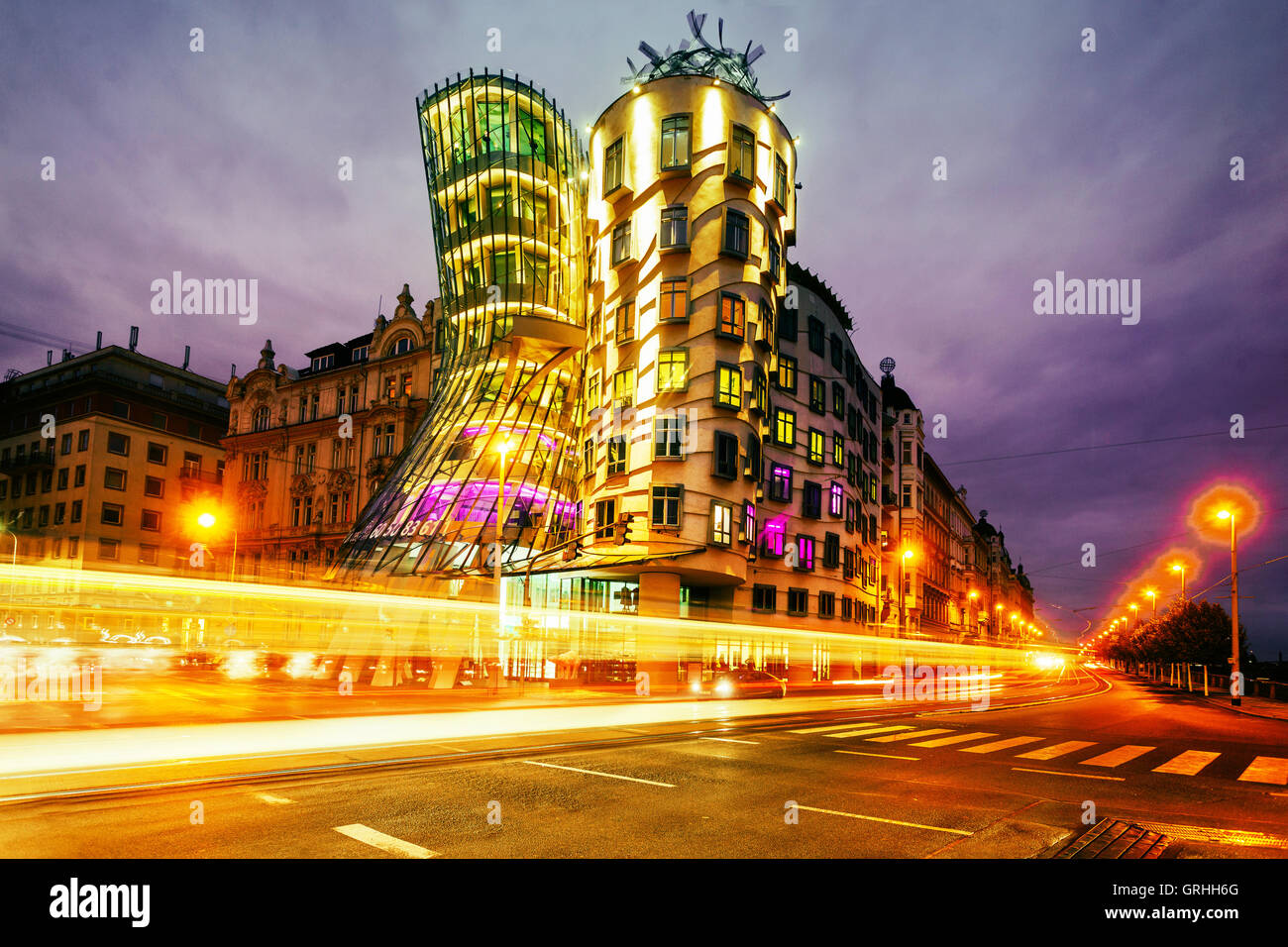The Dancing House designed by Frank Gehry, building Prague night coming, Czech Republic, Europe busy Stock Photo