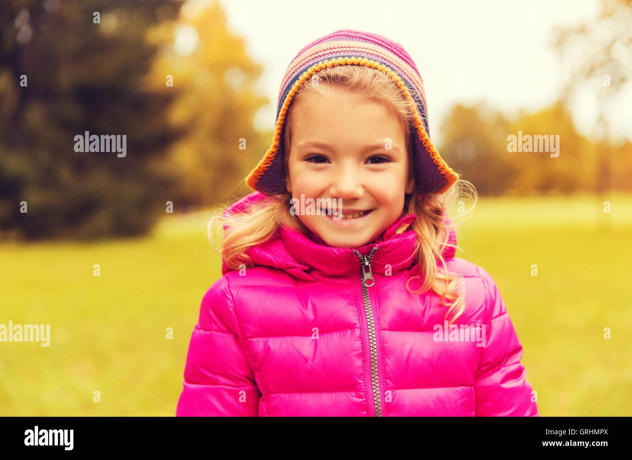 happy beautiful little girl portrait outdoors Stock Photo - Alamy