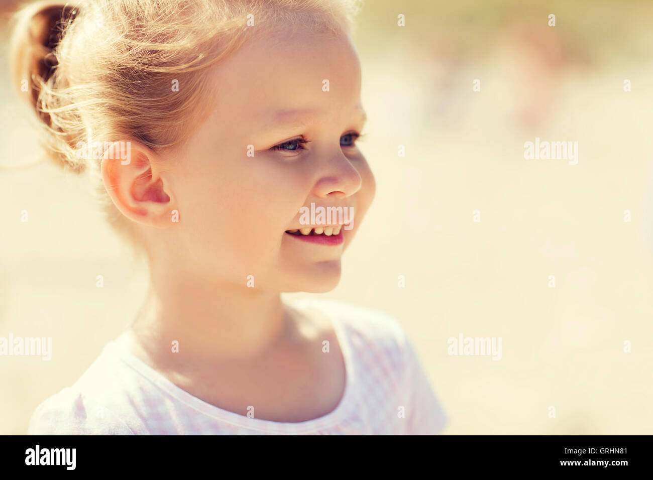 happy beautiful little girl portrait outdoors Stock Photo - Alamy