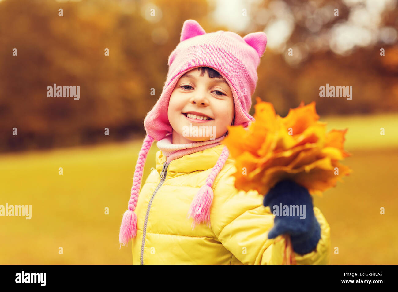 happy beautiful little girl portrait outdoors Stock Photo - Alamy