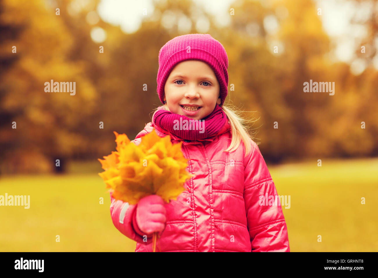 happy beautiful little girl portrait outdoors Stock Photo - Alamy