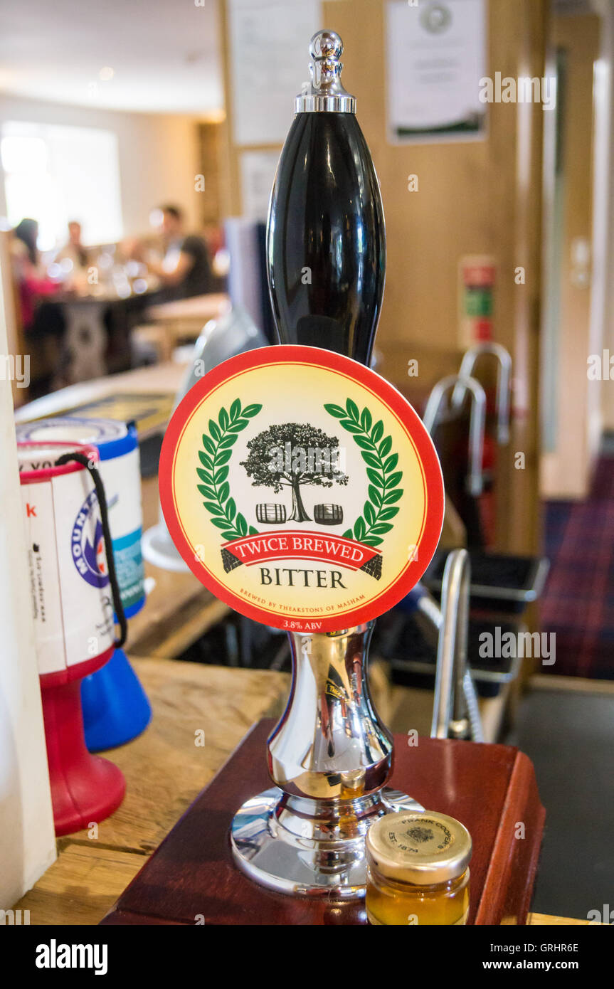 A pump clip of "Twiced Brewed Bitter" brewed by Theakstons of Masham