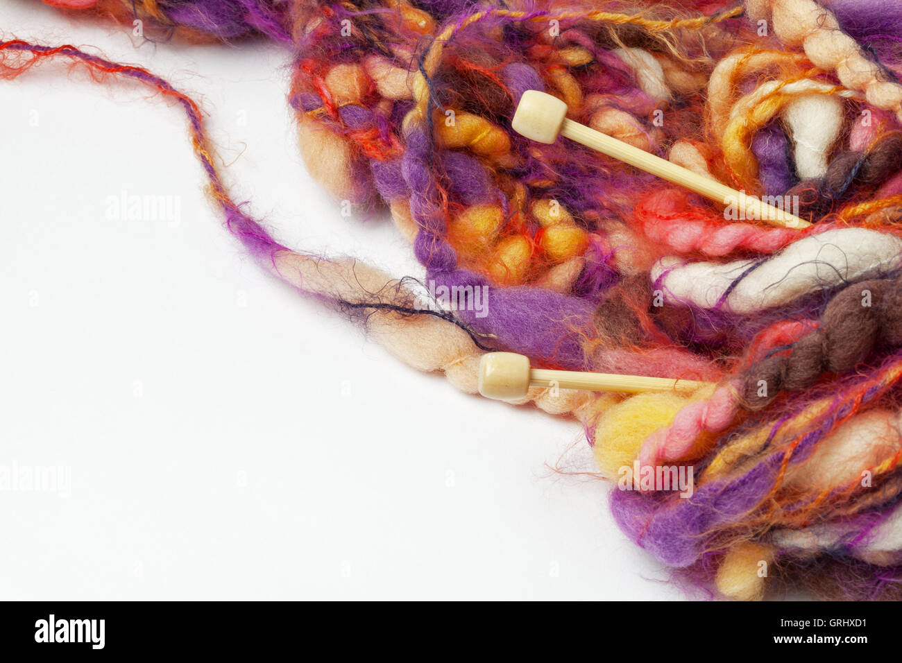 Image of colorful mohair yarn and needles. Stock Photo