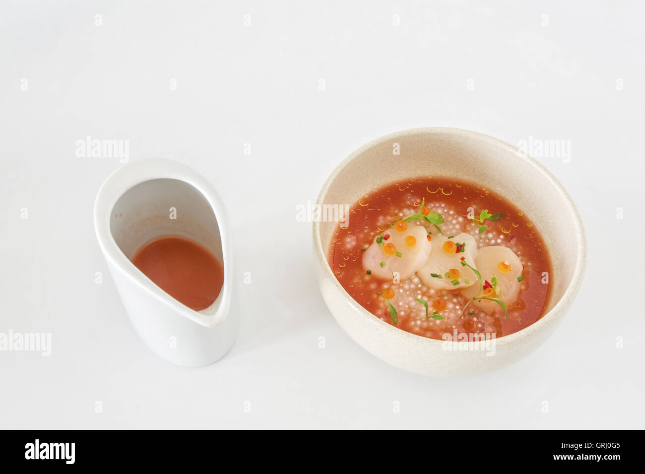 shellfish clams with molecular oysters and broth Stock Photo Alamy
