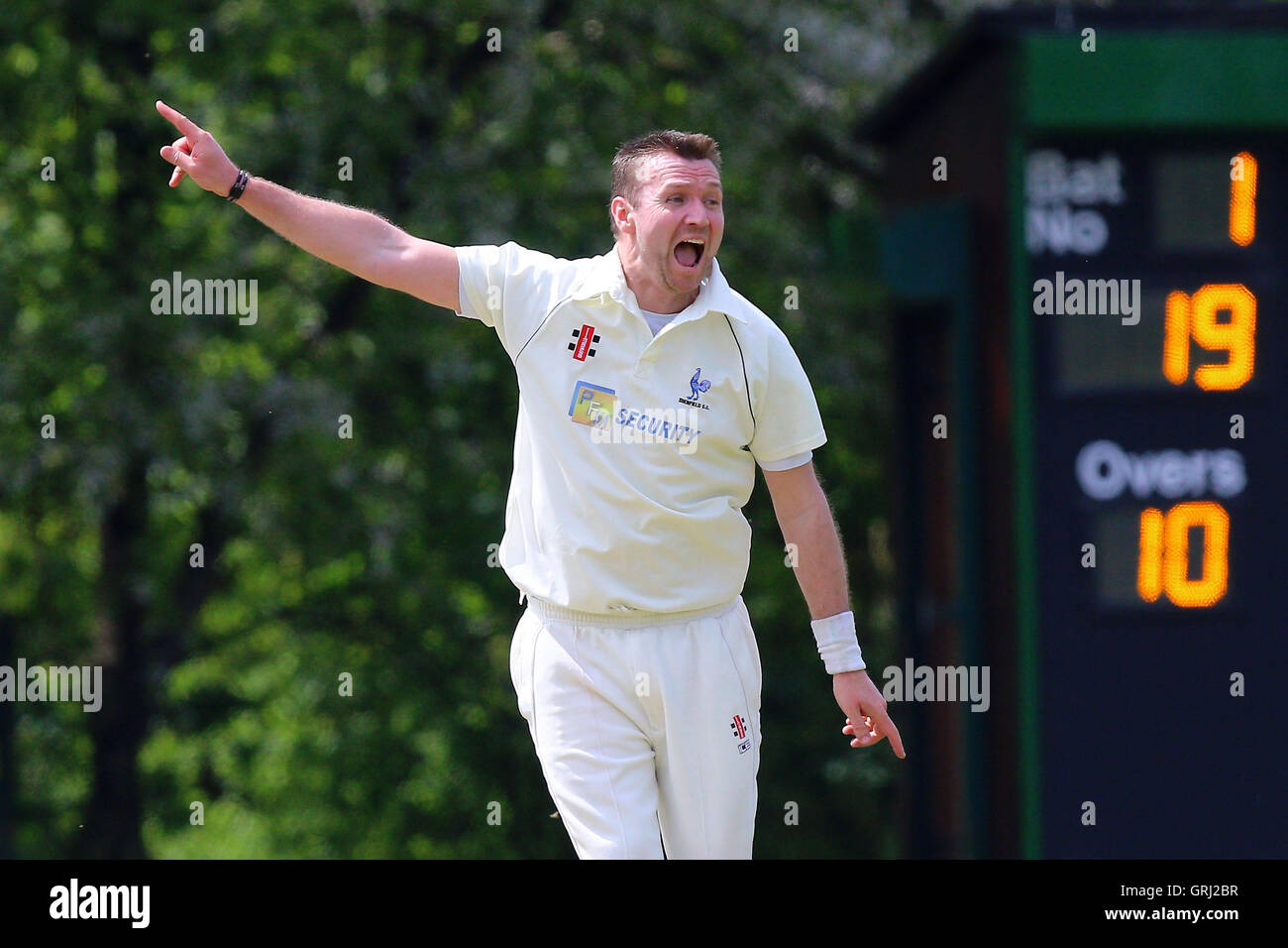Michael Hindley in bowling action for Shenfield during Wanstead and