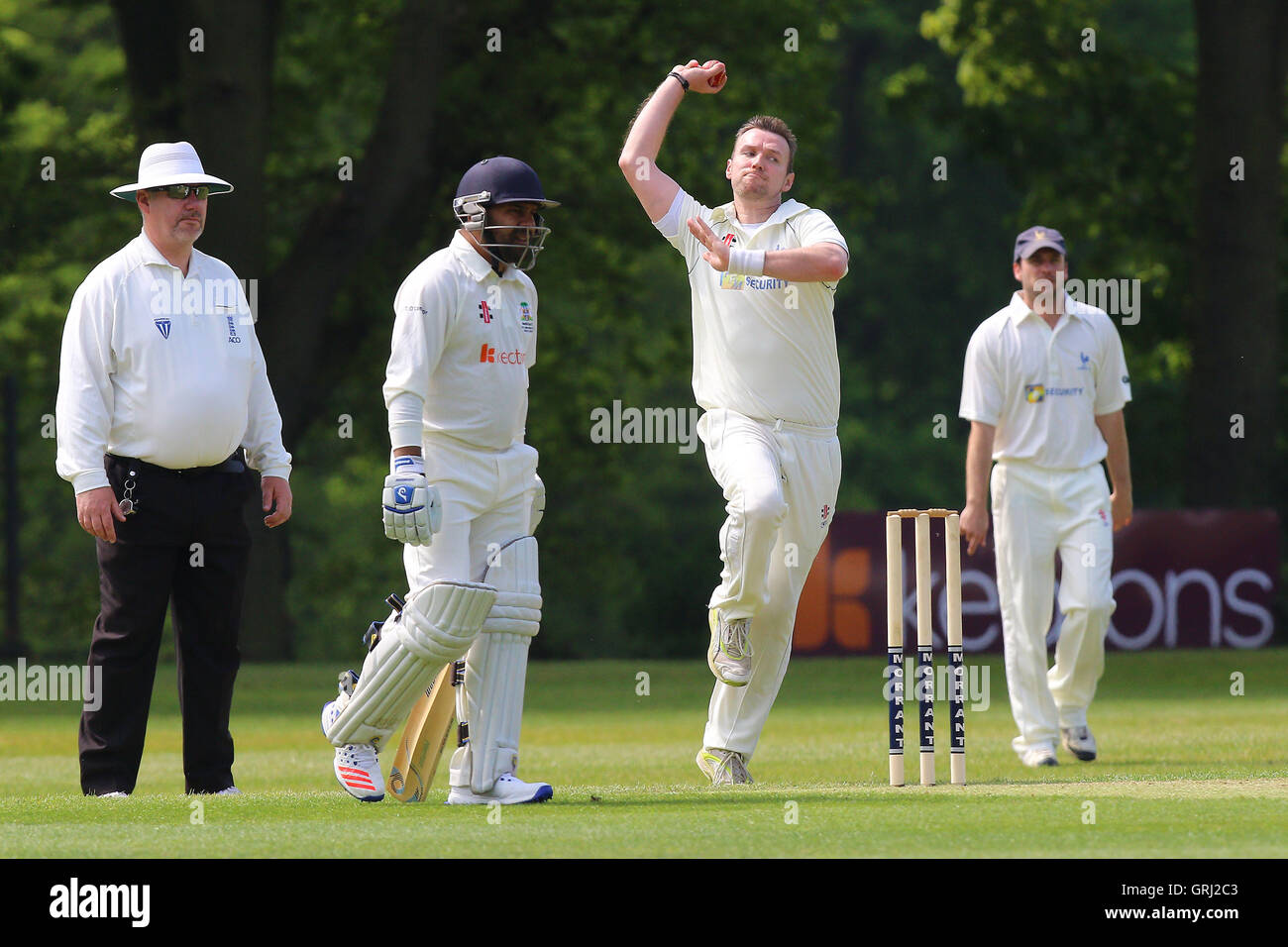 Michael Hindley in bowling action for Shenfield during Wanstead and