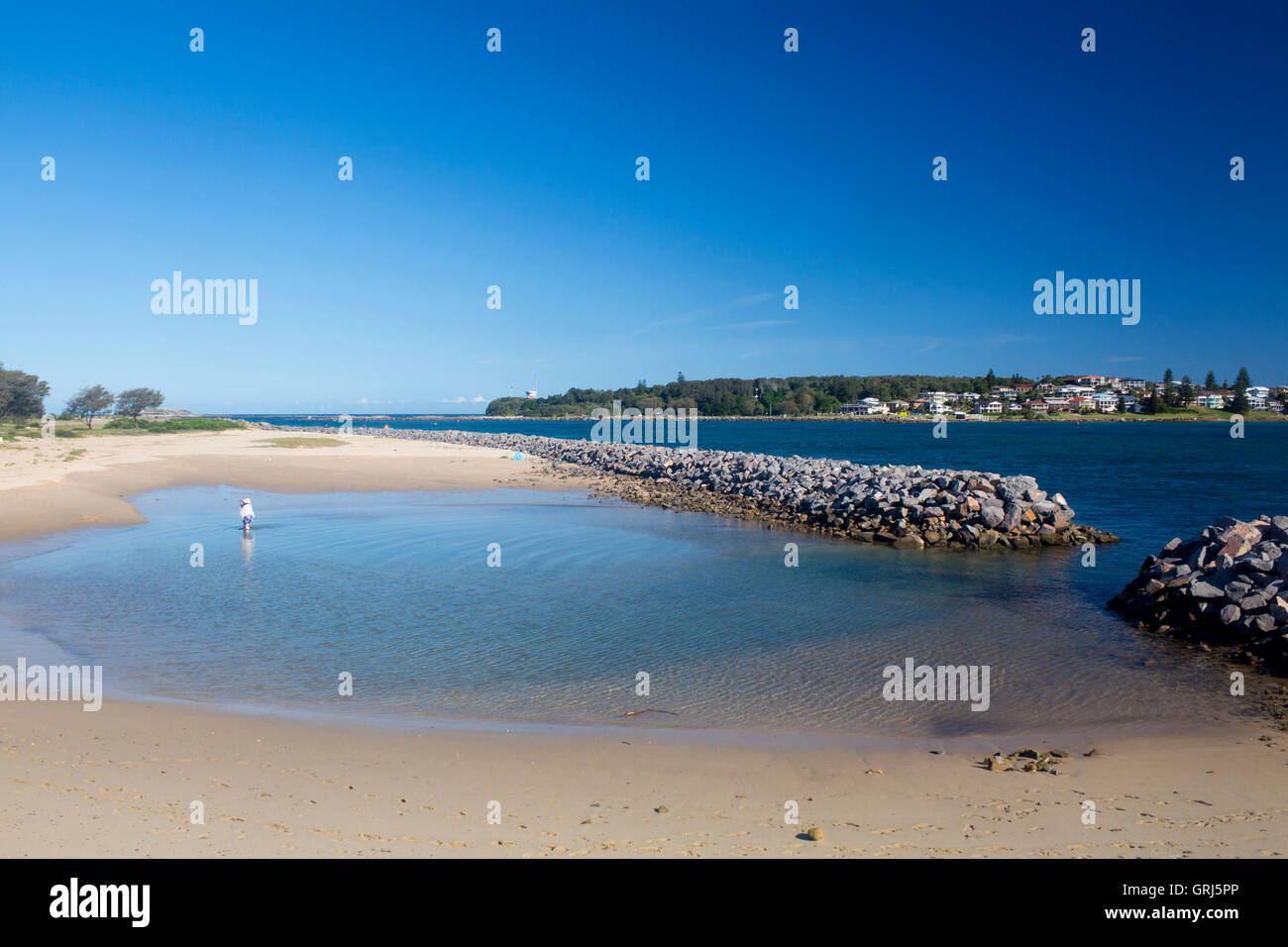 Granny's Pool, created by gap in breakwater, with view across to Swansea Heads Lake Macquarie New South Wales NSW Australia Stock Photo