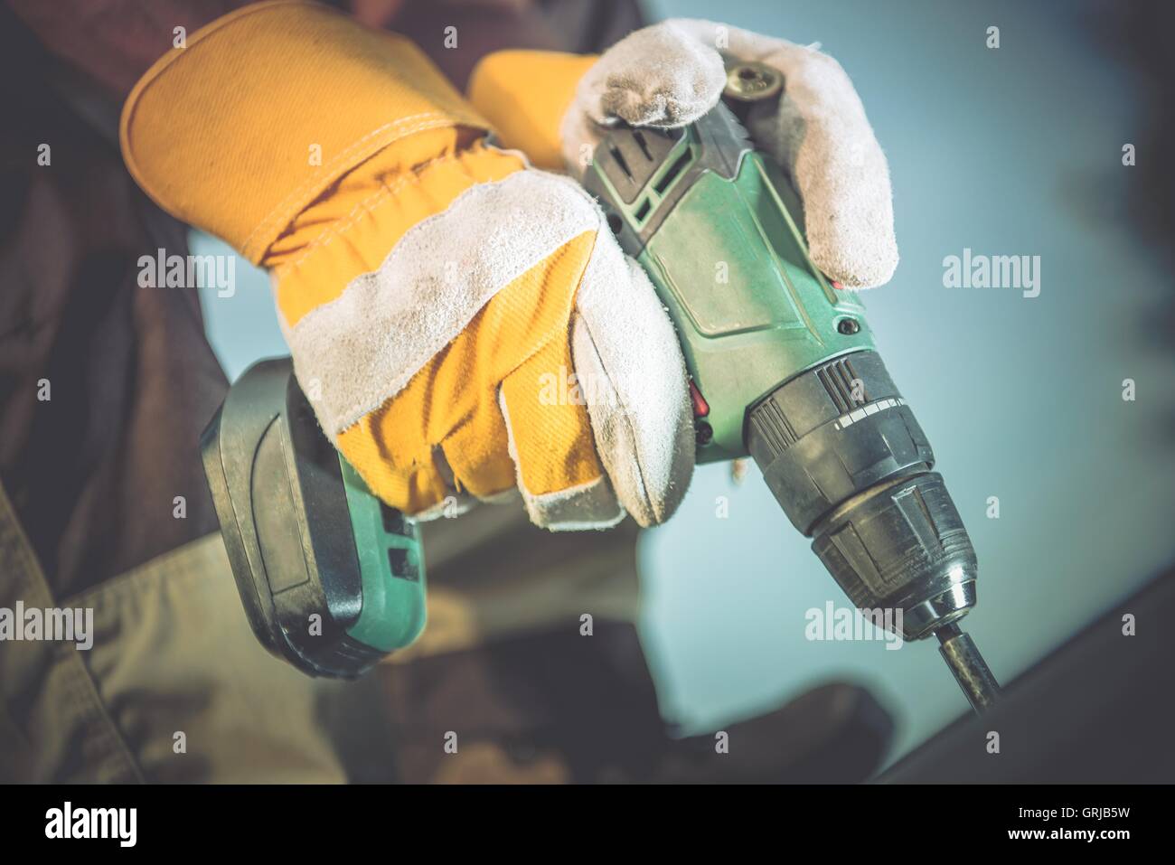 Drill Gun Wood Works. Men with His Drilling Gun in Action. Closeup Photo Stock Photo Alamy