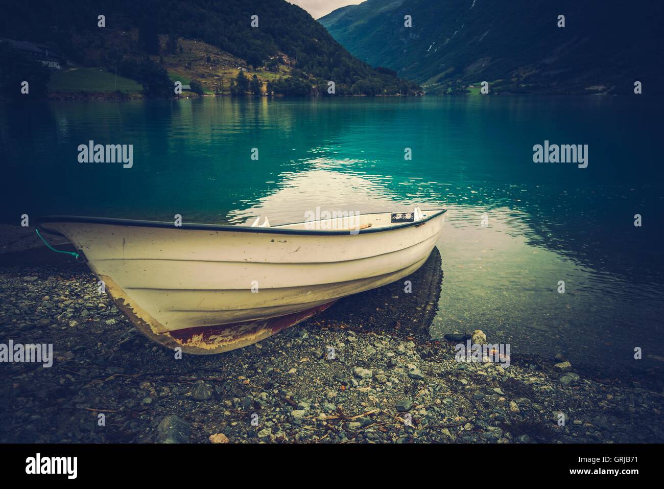 Small Boat on the Fjord Shore. Norway Recreation Theme Stock Photo - Alamy