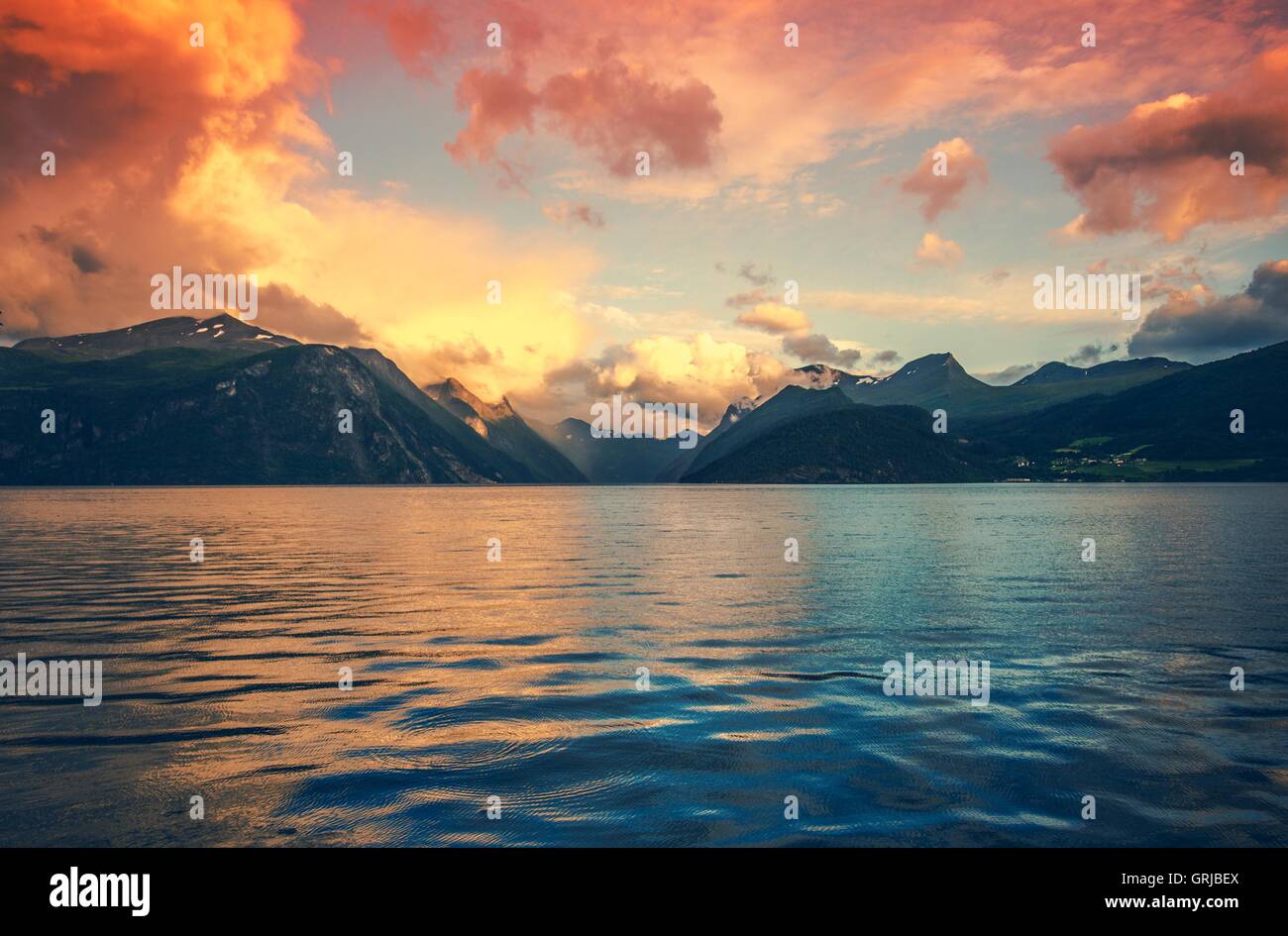 Norway Fjord Sunset Scenery. Scenic Norwegian Landscape. Stock Photo