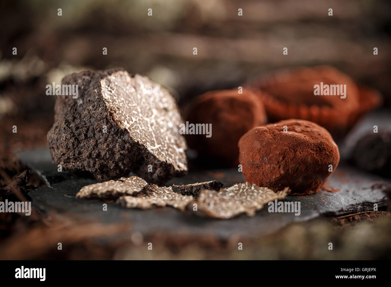 Dark chocolate praline with truffles Stock Photo Alamy