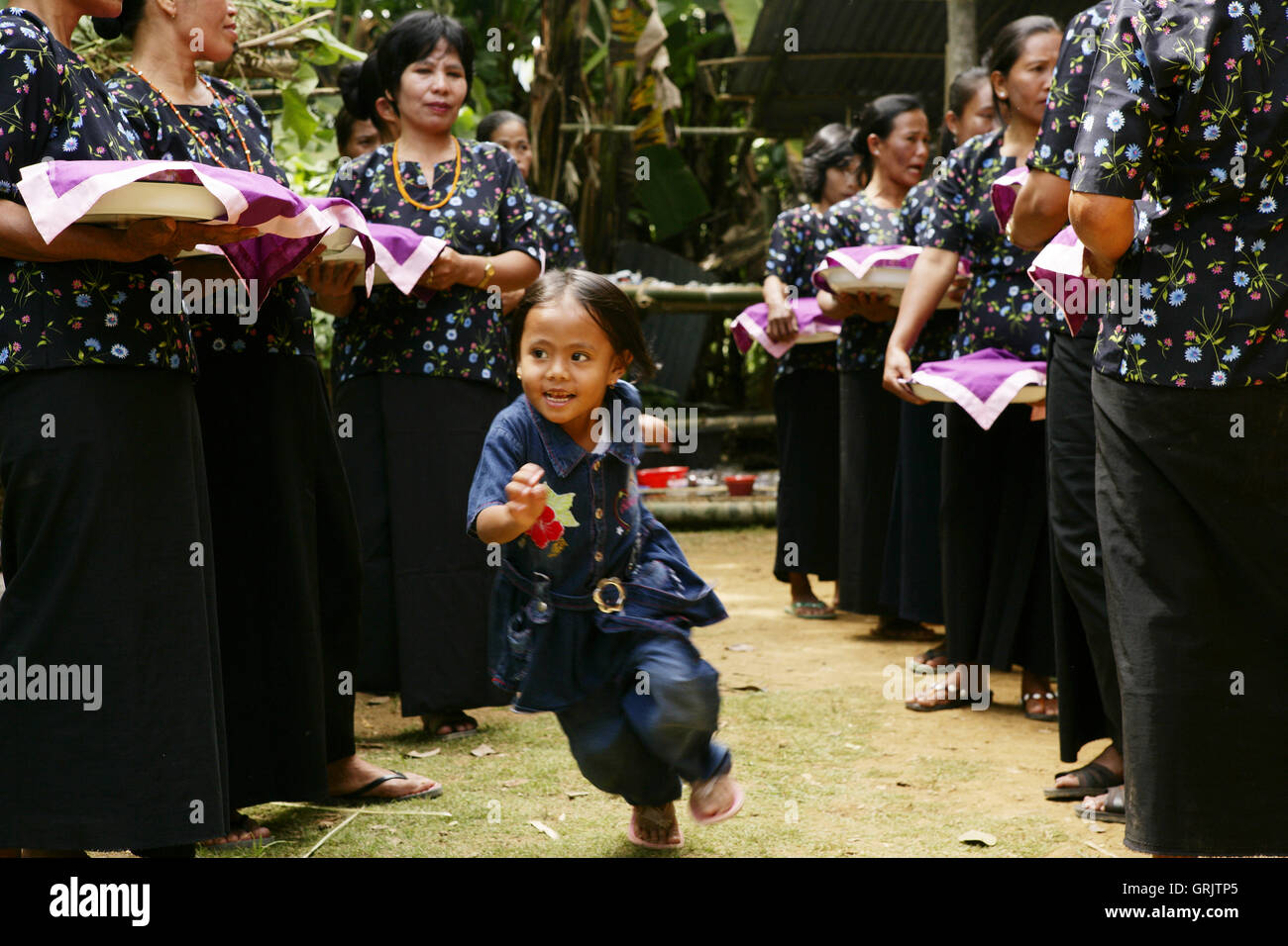 Young girl in beaded dress, Tana Toraja, South Sulawesi, Indonesia Stock Photo