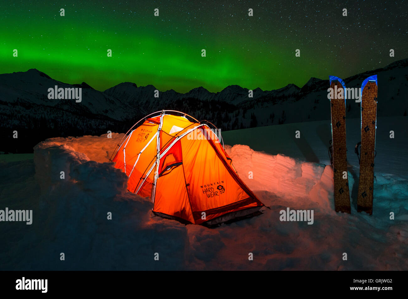 Snowboard expedition base camp in Canada with the northern lights Stock