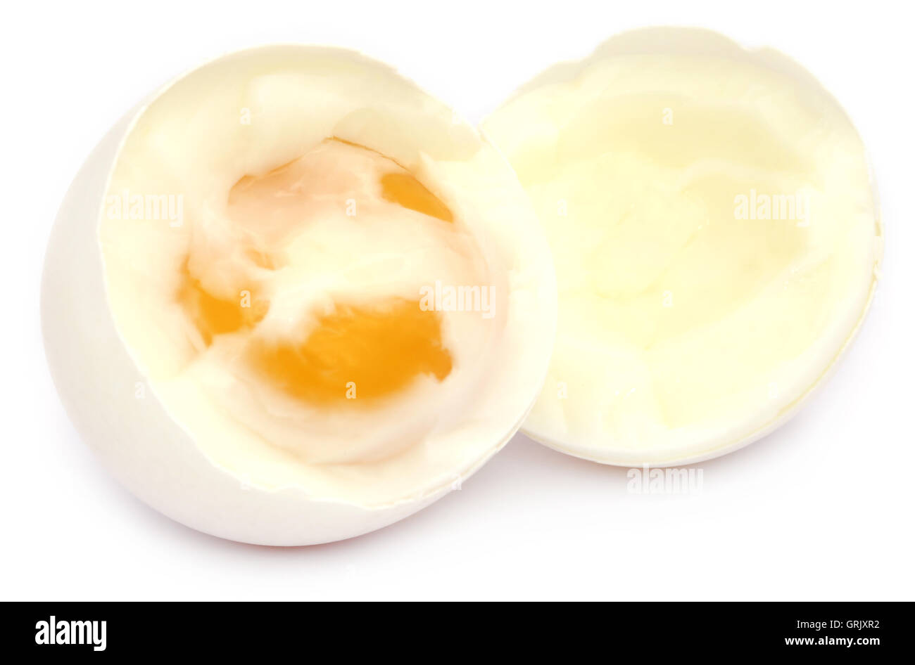Broken boiled egg over white background Stock Photo
