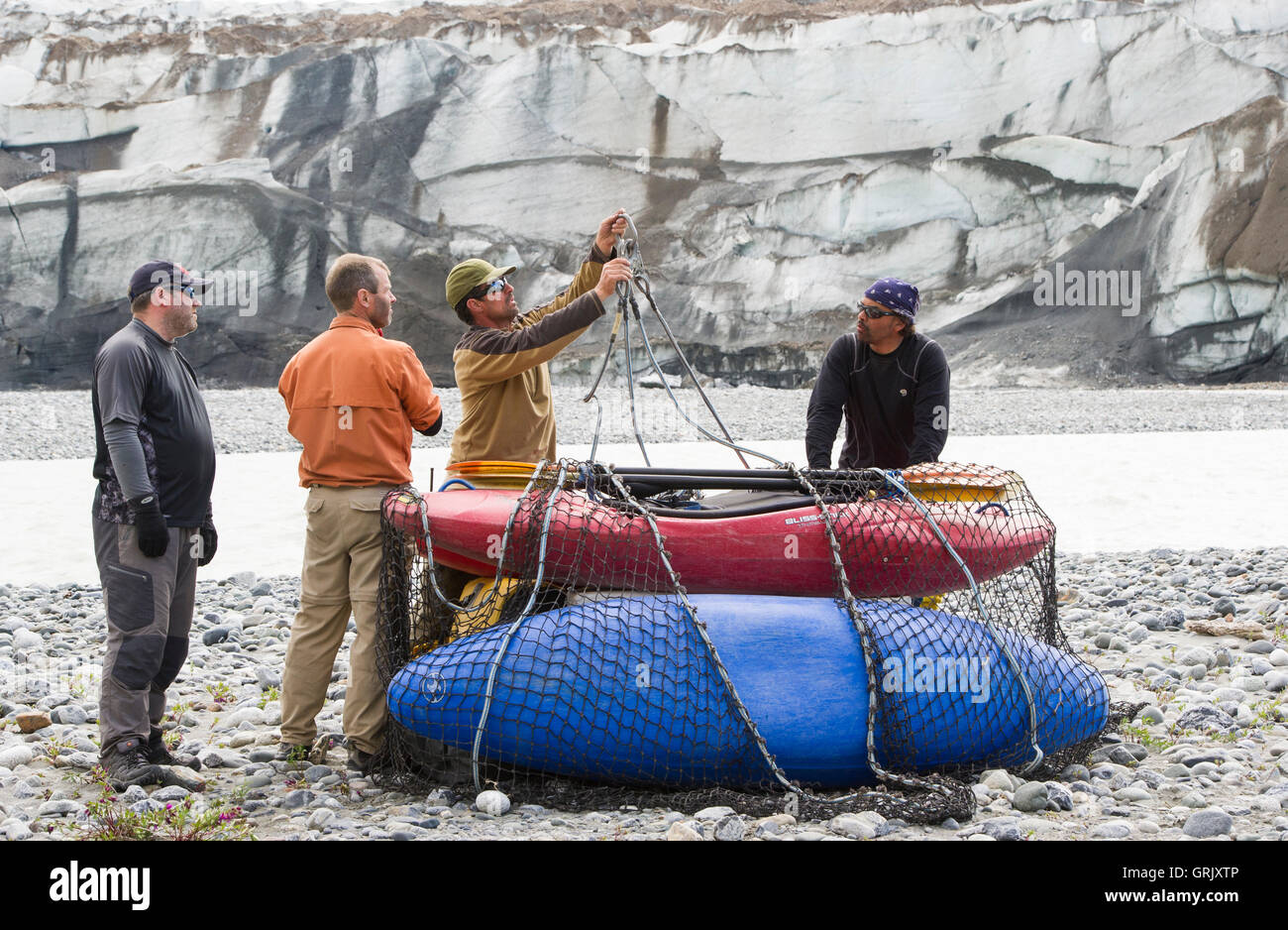 Rafters prepare cargo net for helicopter portage over the Tweedsmuir ...
