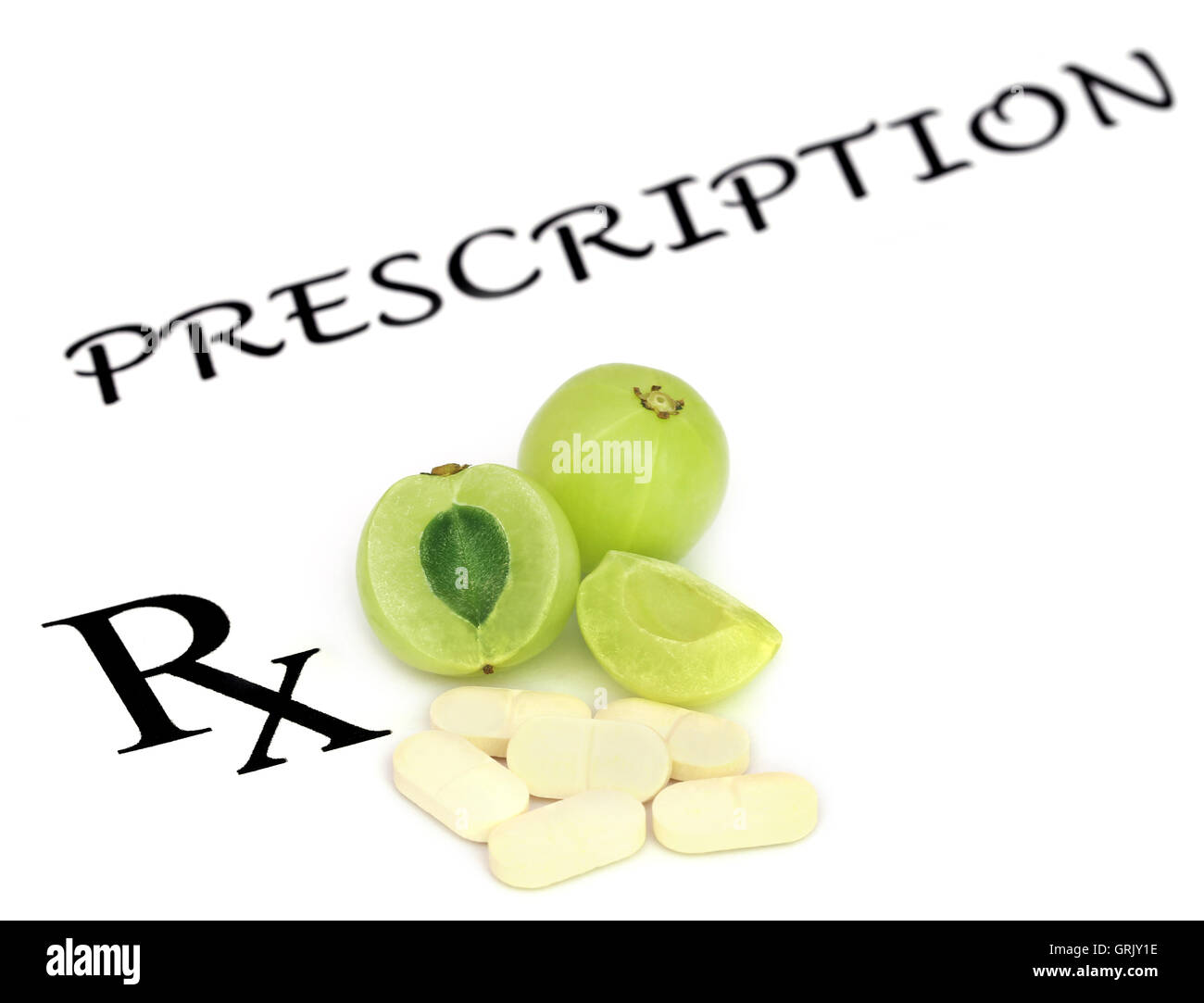 Amla fruits with pills in a prescription Stock Photo