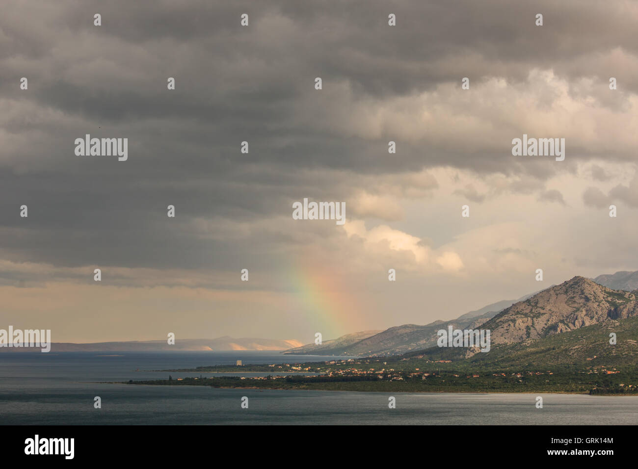 Magic landscape of rainbow above the sea Stock Photo