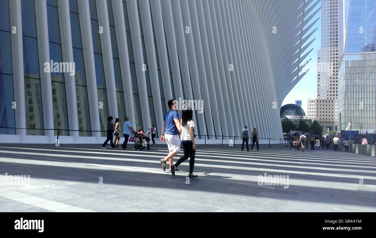 People walking past the Transportation Hub  Oculus at the World Trade Center. Stock Photo