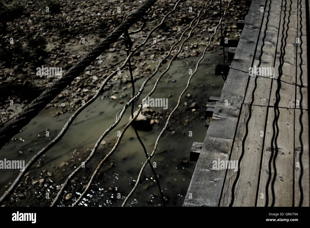 wooden bridge over a stream Stock Photo - Alamy