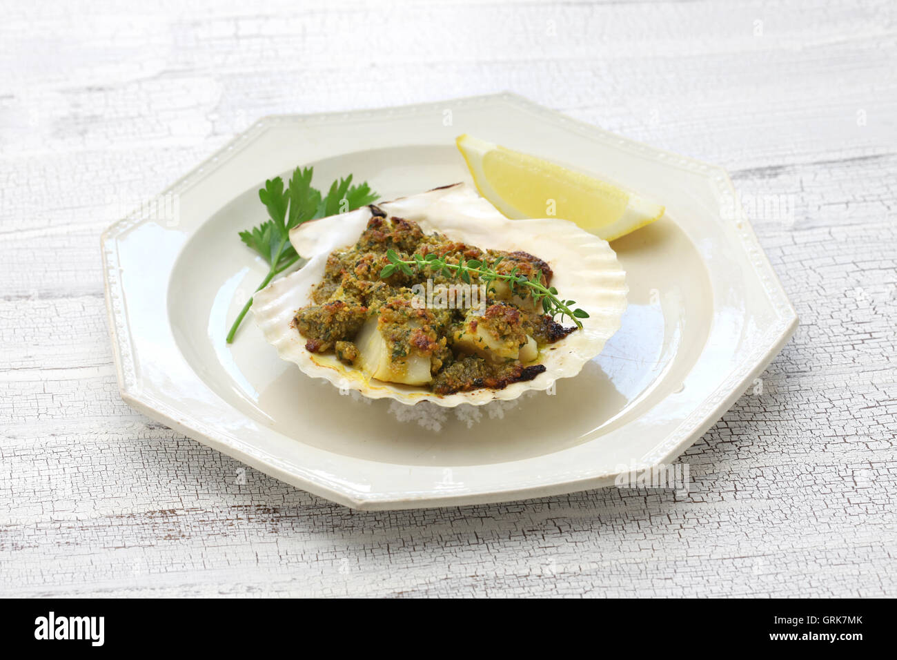 capesante gratinate, baked scallop gratin, italian cuisine Stock Photo