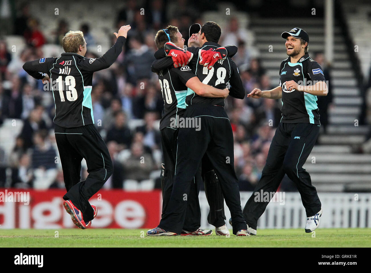 Surrey players celebrate the wicket of Graham Napier - Surrey Lions vs Essex Eagles - Friends Life T20 South Division Cricket at the Kia Oval,London - 13/06/12. Stock Photo