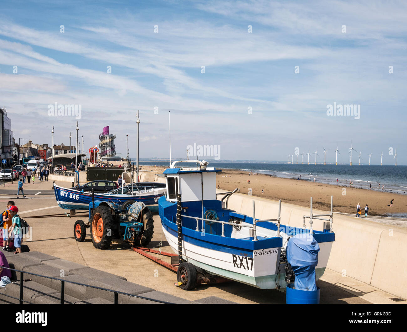 Fishing Cobles Esplanade Beacon and Wind Turbines Redcar UK Stock Photo