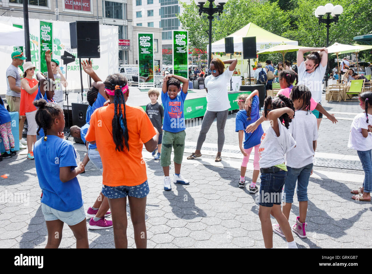 New York City,NY NYC,Manhattan,Midtown,Union Square Park,public park,Summer in the Square,weekly entertainment series,Children's Pavilion,fitness clas Stock Photo