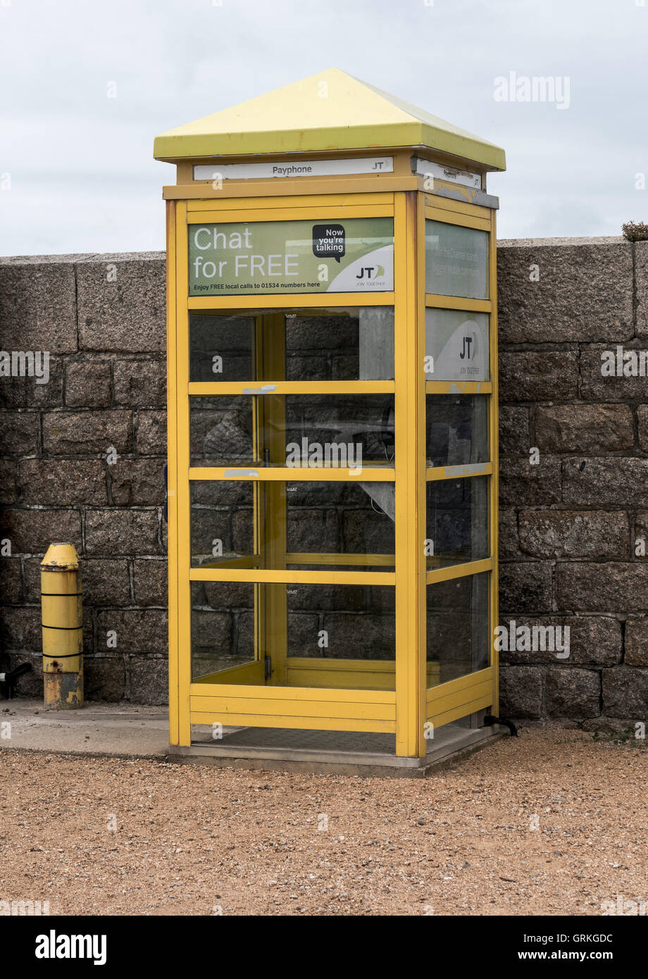 Yellow telephone box hi-res stock photography and images - Alamy