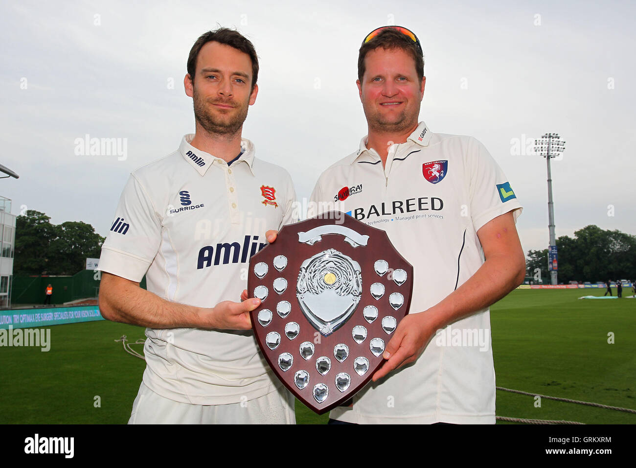 Essex captain James Foster (L) and Kent Captain Rob Key with the Mike Denness Challenge Shield - Kent CCC vs Essex CCC - LV County Championship Division Two Cricket at the St Lawrence Ground, Canterbury - 09/06/14 Stock Photo