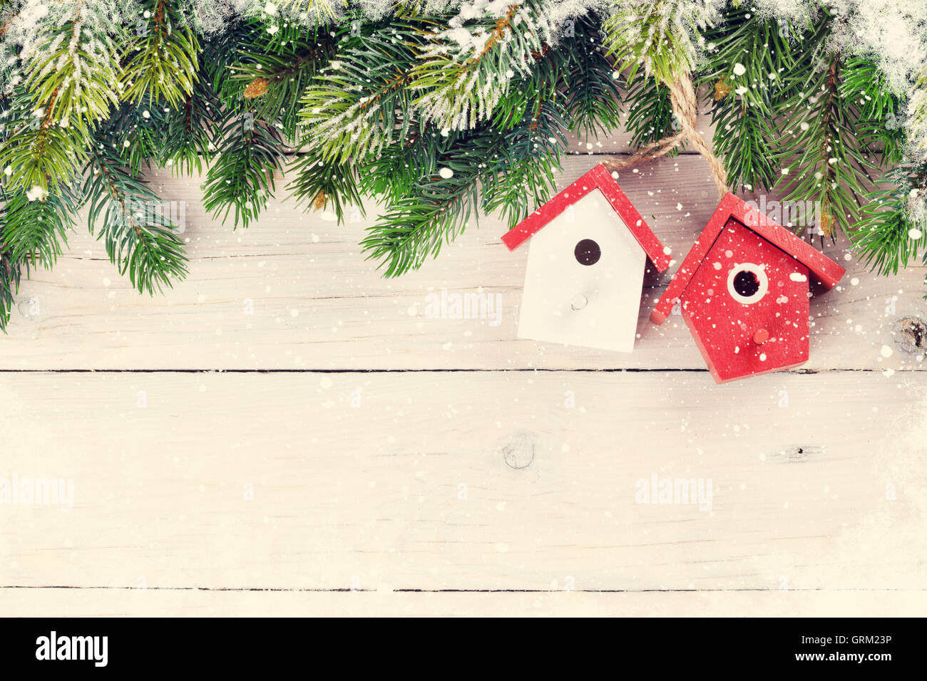 Christmas wooden background with snow fir tree and decor. View with ...