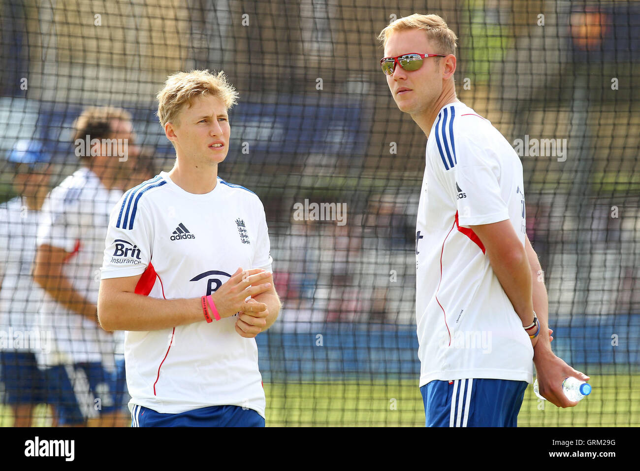 Joe Root (L) and Stuart Broad are seen during the warm-up - Essex CCC vs England - LV Challenge Match at the Essex County Ground, Chelmsford - 01/07/13 Stock Photo