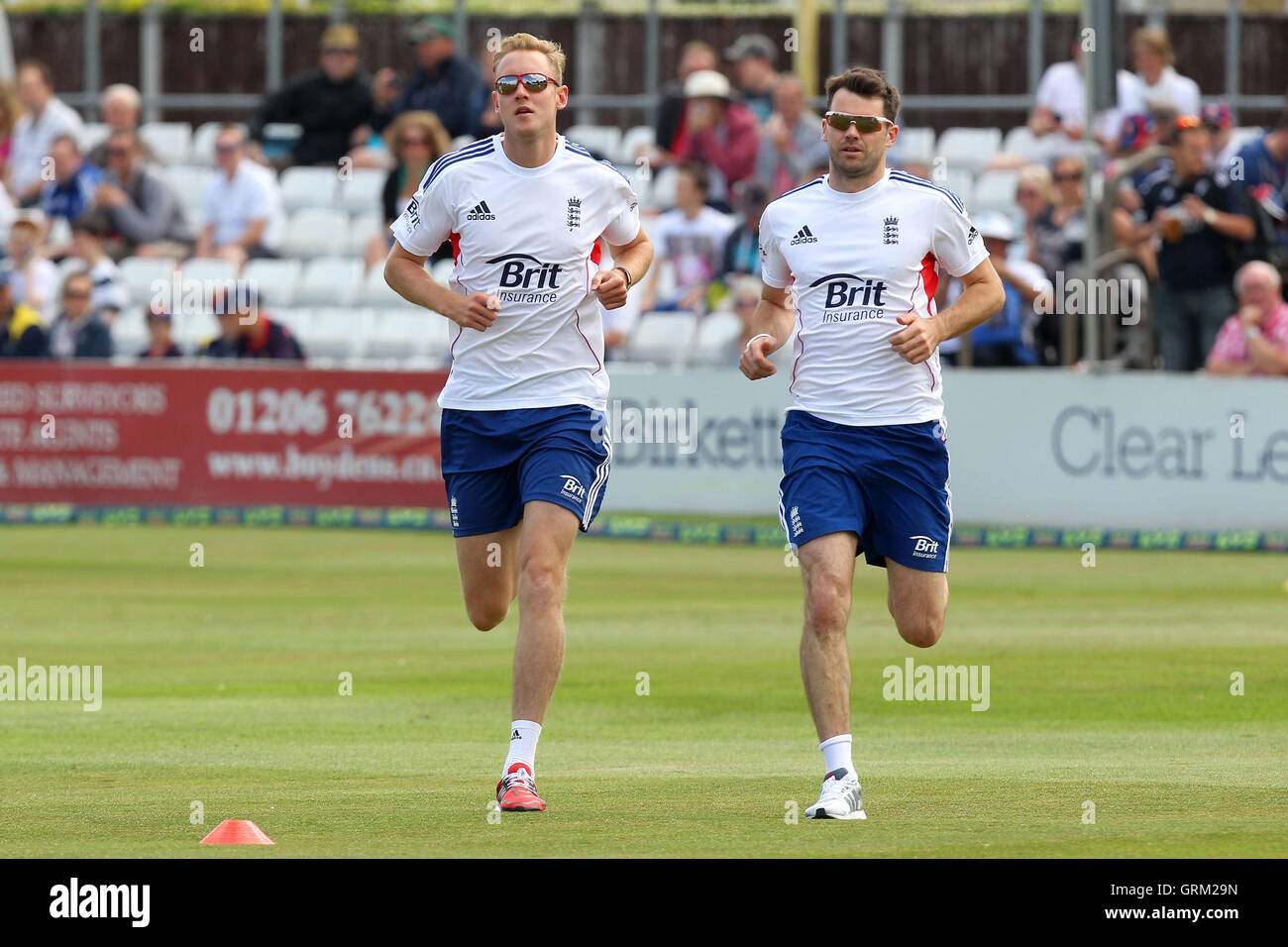 England bowlers Stuart Broad (L) and James Anderson - Essex CCC vs England - LV Challenge Match at the Essex County Ground, Chelmsford - 01/07/13 Stock Photo