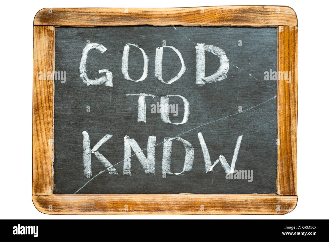 good to know phrase handwritten on vintage school slate board isolated on white Stock Photo